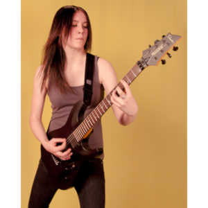 I saw an amazing picture on a web site of this female guitarist.  She was beautiful.  After a bit of searching, I was able to contact her and we did this shoot together.